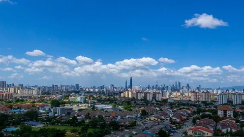 4K Time lapse of dramatic and fluffy moving clouds over Kuala Lumpur, Malaysia. Stock Footage 122278276