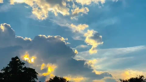 4K Time-lapse Dramatic Boiling Cloudscape at Sunrise with Sunlight Stock Footage 332157396