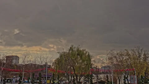 4K Time-lapse Dramatic Clouds Over Park with Turkish Flags Stock Footage 323880748