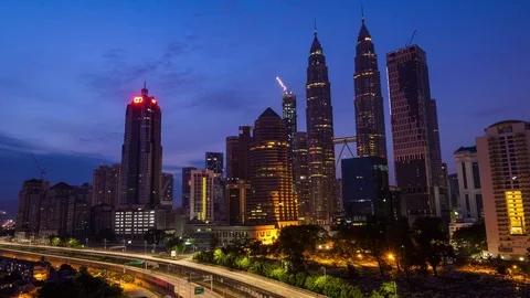 4K time lapse of dramatic sunrise in downtown Kuala Lumpur, Malaysia Stock Footage 78145614