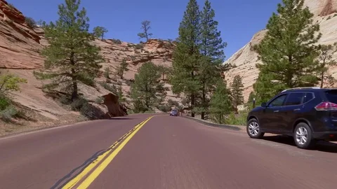 4K time lapse driving through Zion National Park day time Stock Footage 75540582