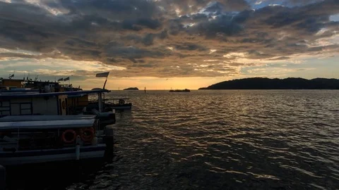 4K Time-lapse during beautiful sunset and dramatic cloud in Kota Kinabalu Stock Footage 77785734