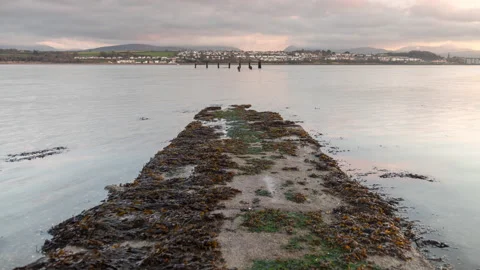4k time lapse of ebbing tide on the Menai Straits, Anglesey, North Wales Stock Footage 144573215