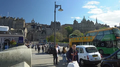 4K Time Lapse of Edinburgh Old Town Skyline on Sunny Day With Crowds of Tourists Stock Footage 119140404