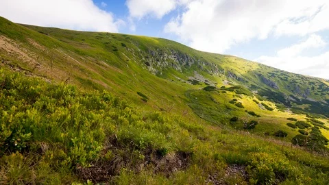 4K Time Lapse Of Fast Moving Clouds Over The Hill Stock Footage 121343073