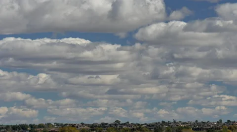 4K Time Lapse of a Flock of  Stratocumulus Clouds Stock Footage 54718883