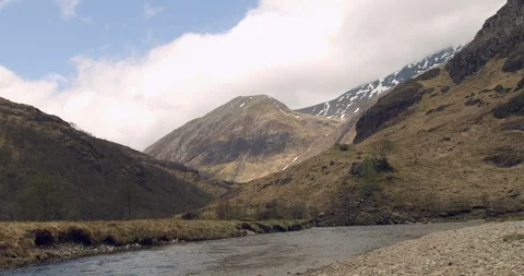4K Time Lapse of the Glen Coe Scottish Mountains. Calm Lake and Mountain range. Stock Footage 93065587