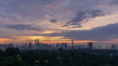 4K Time lapse of glory sunrise over downtown Kuala Lumpur Stock Footage 96984874