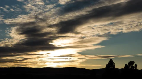4K Time Lapse of Golden Wave Clouds in Prairie Sunset Stock Footage 54715212