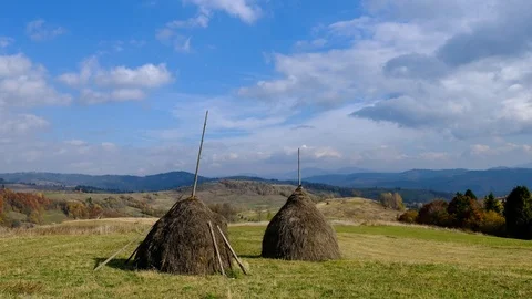 4K time lapse of haystack on a mountain hill. Carpathian Mountains.  Footage  Stock Footage 120791731