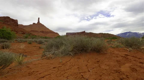 4k Time Lapse Of Heavy Clouds Passing Over Desert Landscape. Stock Footage 51753332