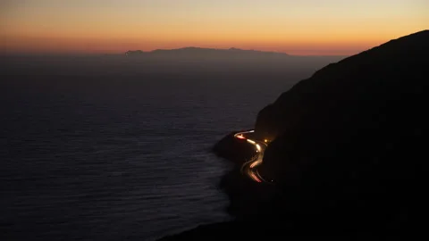 4K time lapse high view of the Channel Islands and PCH evening traffic in Malibu Stock Footage 203791623
