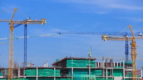 4k Time-lapse of Industrial construction crane with blue sky Stock Footage