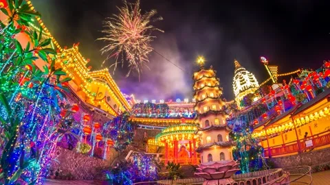 4K Time lapse of Kek Lok Si Temple view with firework and light up during sunset Stock Footage 231588268