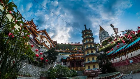 4K Time lapse of Kek Lok Si Temple view with firework and light up during sunset Stock Footage 231588344