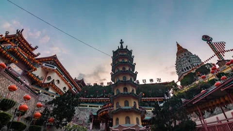 4K Time lapse of Kek Lok Si Temple view with firework and light up during sunset Stock Footage 231588369
