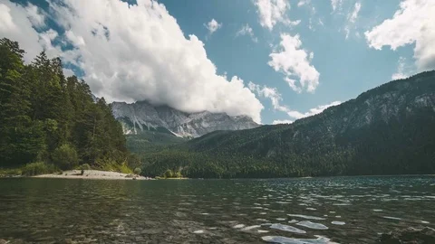 4K time lapse lake Eibsee with a view over the mountain Zugspitze in Germany Stock Footage 85090563