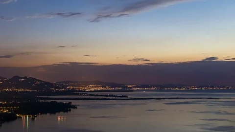 4K Time Lapse Lake Night Mountains Stars City Lights Boats Airplains Stock Footage 71384577