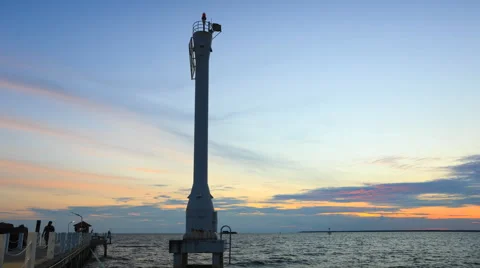4K Time-Lapse Lighted Beacon or Leading Light with Sunsets and Clouds Stock Footage 68799567