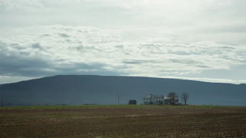 4K time lapse of a lone farm house in the Shenandoah Valley in Virginia Stock Footage 167774014