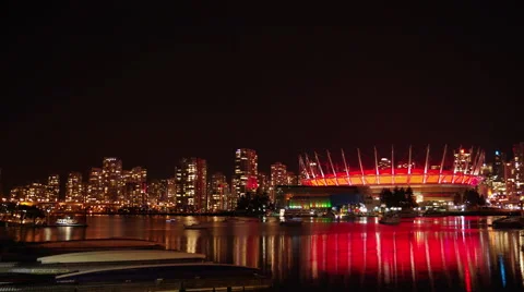 4K Time Lapse - Long exposure cityscape and water taxis at night Vancouver Stock Footage 39961219