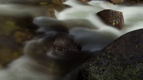 4K time lapse long exposure of blurry motion water rapids and river rocks Stock Footage 146393907