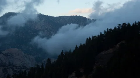 4K Time lapse of low valley clouds and blue sky in the San Gabriel Mountains Stock Footage 147947165