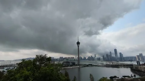 4k Time-lapse of Macau tower with heavy clouds Stock Footage 271628619