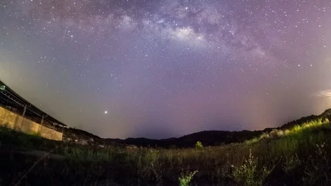 4K time lapse milky way rising during sunrise Stock Footage 104740141