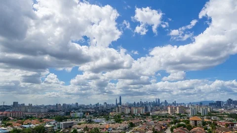 4k Time lapse of monsoon clouds over downtown Kuala Lumpur, Malaysia. Zoom In. Stock Footage 122926283