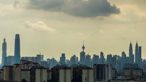 4K time lapse of monsoon clouds over down town Kuala Lumpur, Malaysia. Stock Footage 130829547