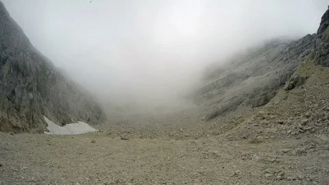 4K. Time Lapse in mountains with changeable weather: sun and deep clouds. Video stock 79054980