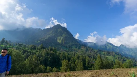 4K Time lapse of moving clouds over mountain range at Bromo  Stock Footage 88757196