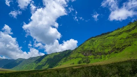 4K Time lapse of moving clouds over mountains at savanna of Bromo. Stock Footage 88952831