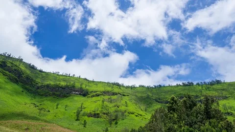 4K Time lapse of moving clouds over mountains at savanna of Bromo Stock Footage 88995335