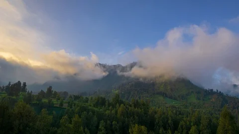 4K Time lapse of moving clouds over mountain range at Bromo Stock Footage 88999132