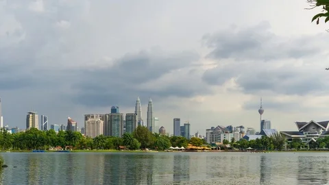 4K Time lapse of moving clouds over downtown Kuala Lumpur, Malaysia. Zoom In. Stock Footage 90467534