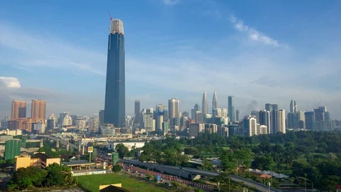 4K Time lapse of moving clouds over The Exchange 106. Stock Footage 94739931