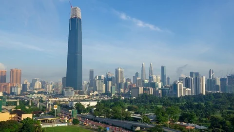 4K Time lapse of moving clouds over The Exchange 106. Zoom In Stock Footage 94739953