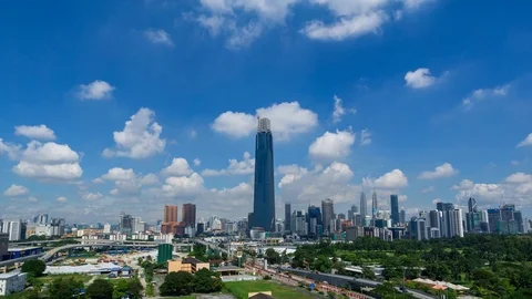 4K Time lapse of moving clouds over The Exchange 106. Stock Footage 96951742