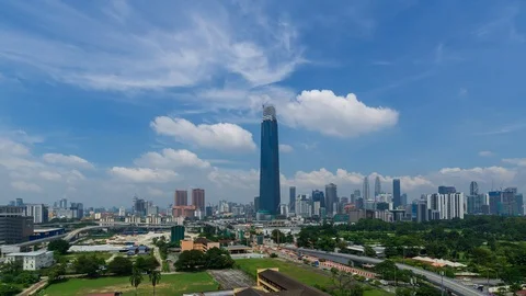 4K Time lapse of moving clouds over Exchange 106 tower. Stock Footage 97636600
