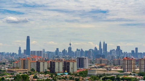4K Time lapse of moving clouds over downtown Kuala Lumpur, Malaysia. Stock Footage 107257517