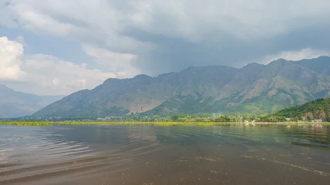 4K Time lapse of moving clouds over Dal Lake in Kashmir, India. Stock Footage 118214787