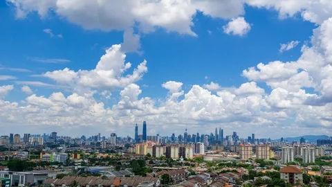 4K Time lapse of moving clouds over down town Kuala Lumpur, Malaysia. Stock Footage 127681178