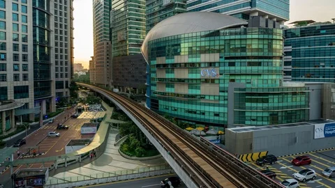 4K Time lapse of moving traffic over downtown city of Kuala Lumpur Stock Footage 100421003