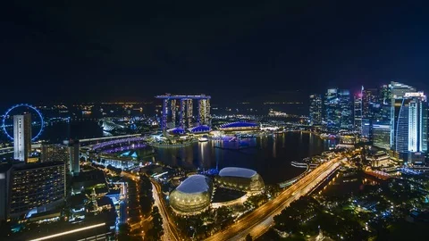 4k time lapse of night to day sunrise at Singapore city skyline. Stock Footage 103927450