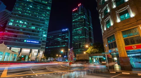 4k time lapse of night light traffic crossroad in singapore Stock Footage 46553628
