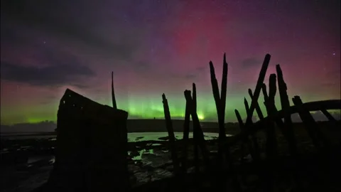 4k time lapse of the northern lights from a shipwreck in Birsay Orkney  Stock Footage 303084596