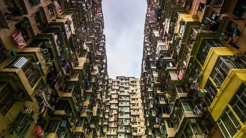 4k. Time lapse of Old Apartment with Moving Cloud in Hong Kong of China Stock Footage