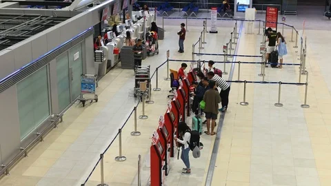 4K Time lapse of passenger used Air Asia self-check in Stock Footage 99654076